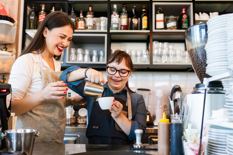 Working at a coffee shop with a person with developmental disabilities